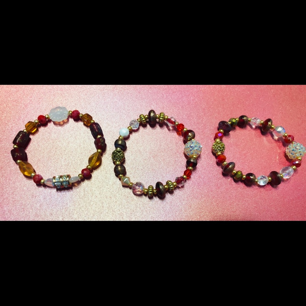 Holiday bracelets.Lots of crystals and charms.